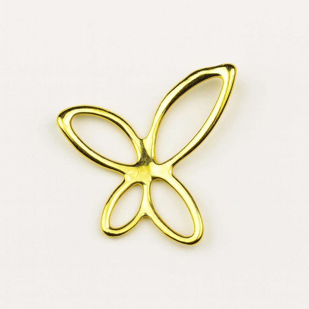 Gold-tone butterfly tooth gem crystal